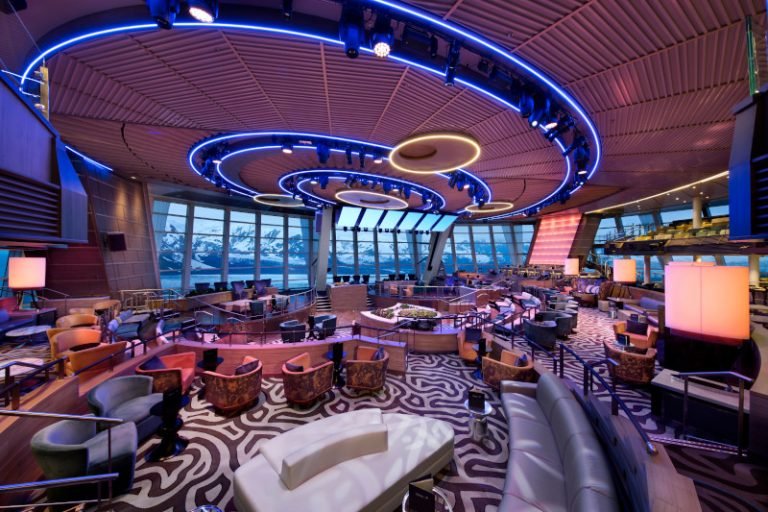 OV, Ovation of the Seas, Two 70 Lounge, bar, entertainment, ocean view, daytime, empty room, view of Alaska mountains and glaciers in windows, (comp image with stock photo from Shutterstock),
NOTE: This is a composite photo made to represent Ovation of the Seas in Alaska. When using this image, please include this disclaimer:
"This image is an artistic rendering of Ovation of the Seas. Features vary by ship."